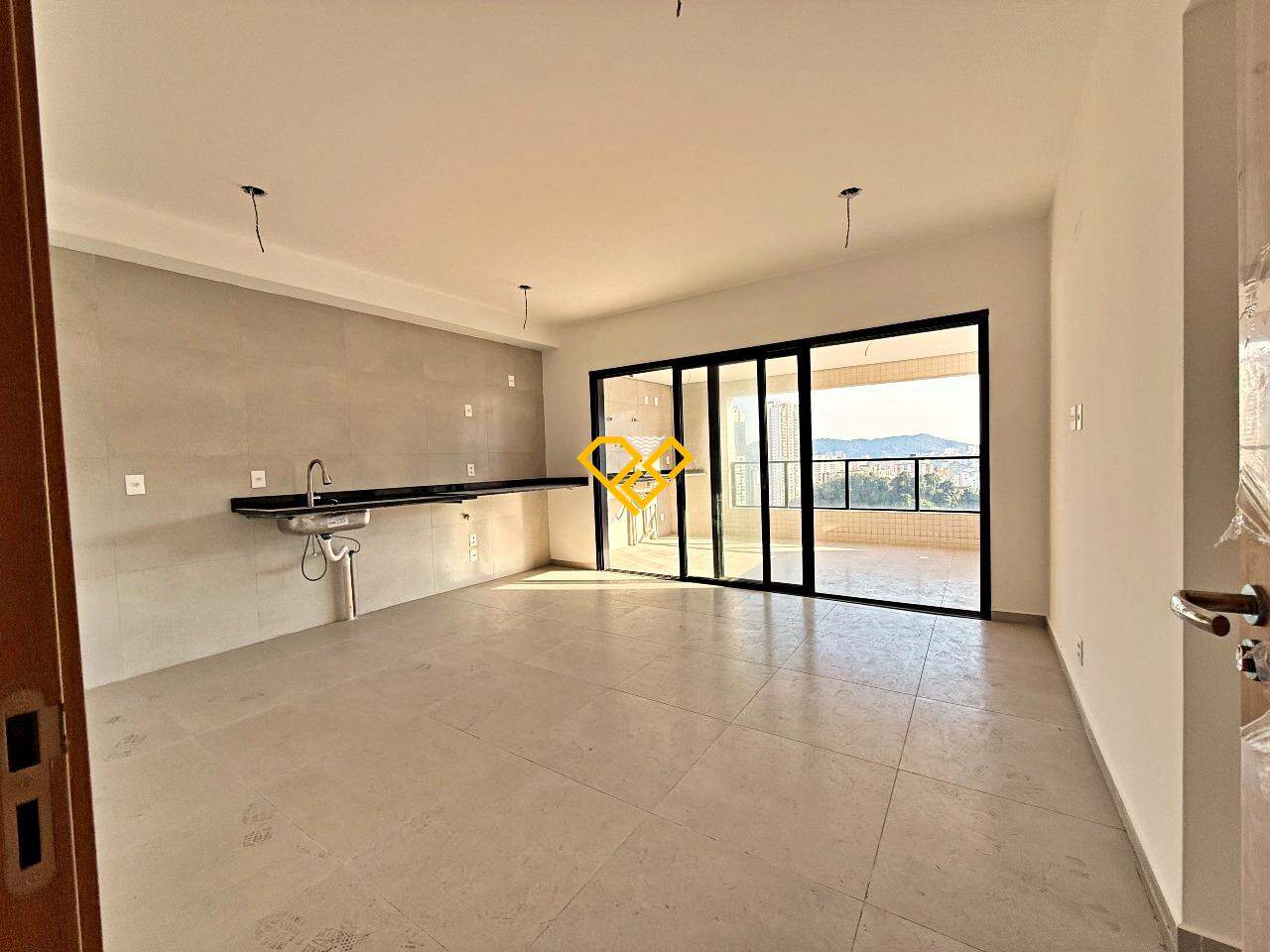 Apartamento à venda no José Menino: Sala e cozinha integrada