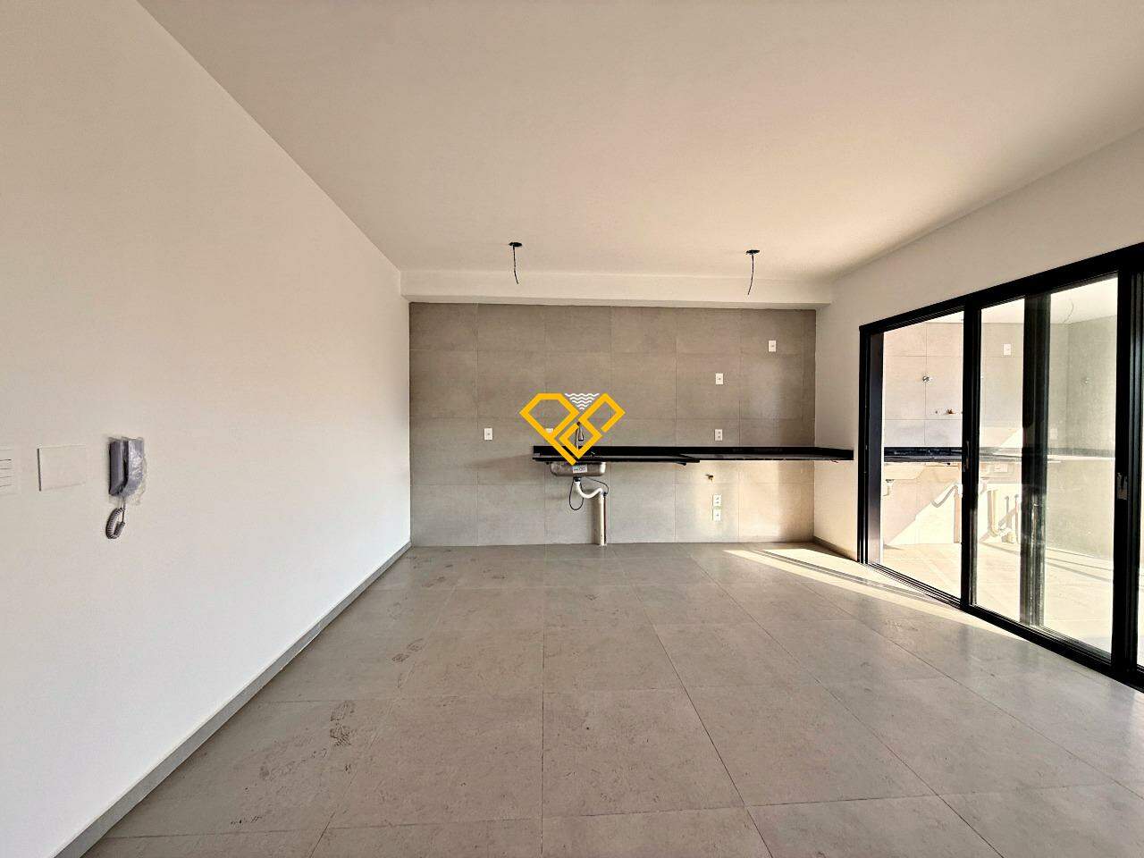 Apartamento à venda no José Menino: Sala e cozinha integrada