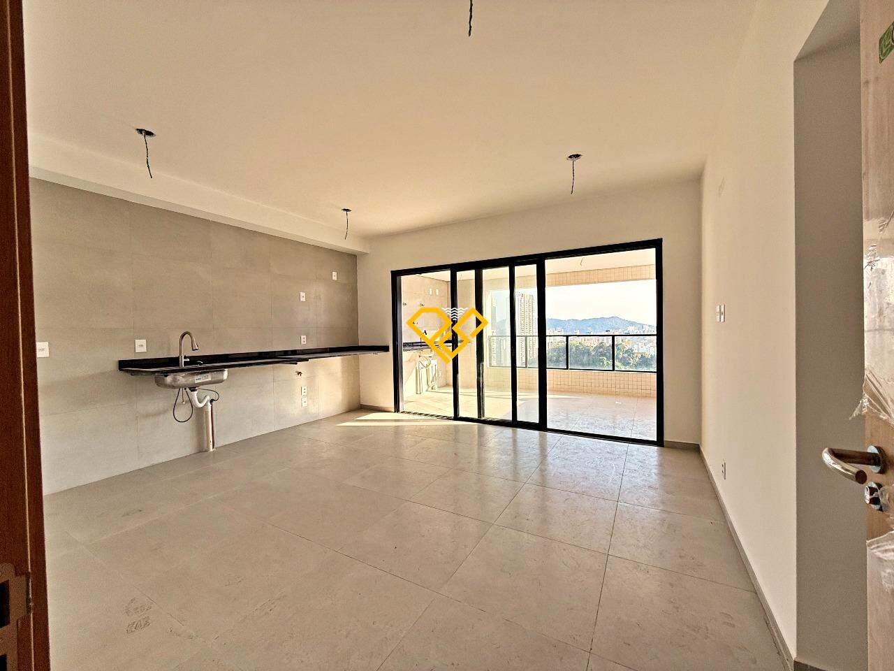 Apartamento à venda no José Menino: Sala e cozinha integrada