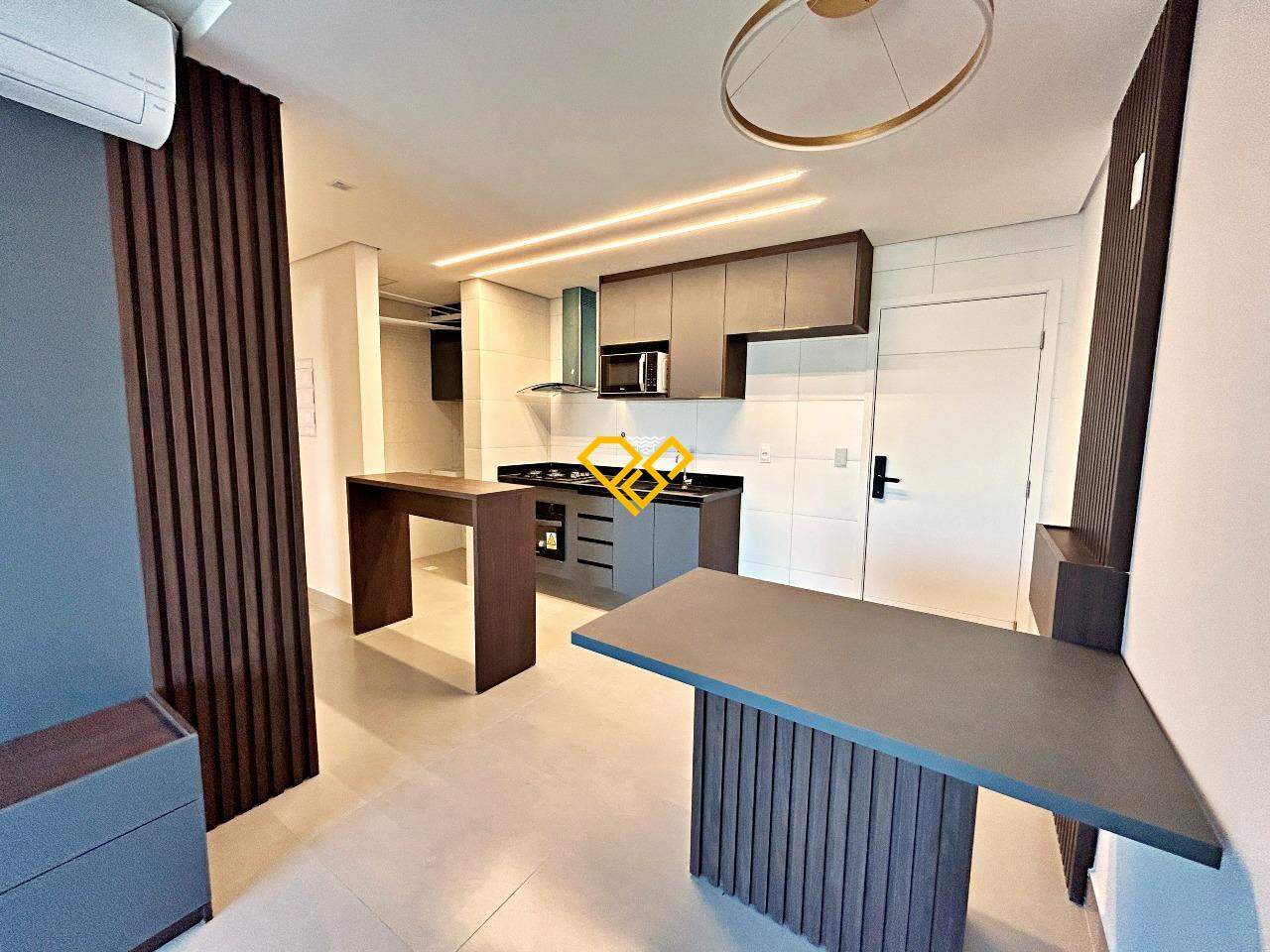Apartamento para aluguel no Macuco: Sala e cozinha integrada