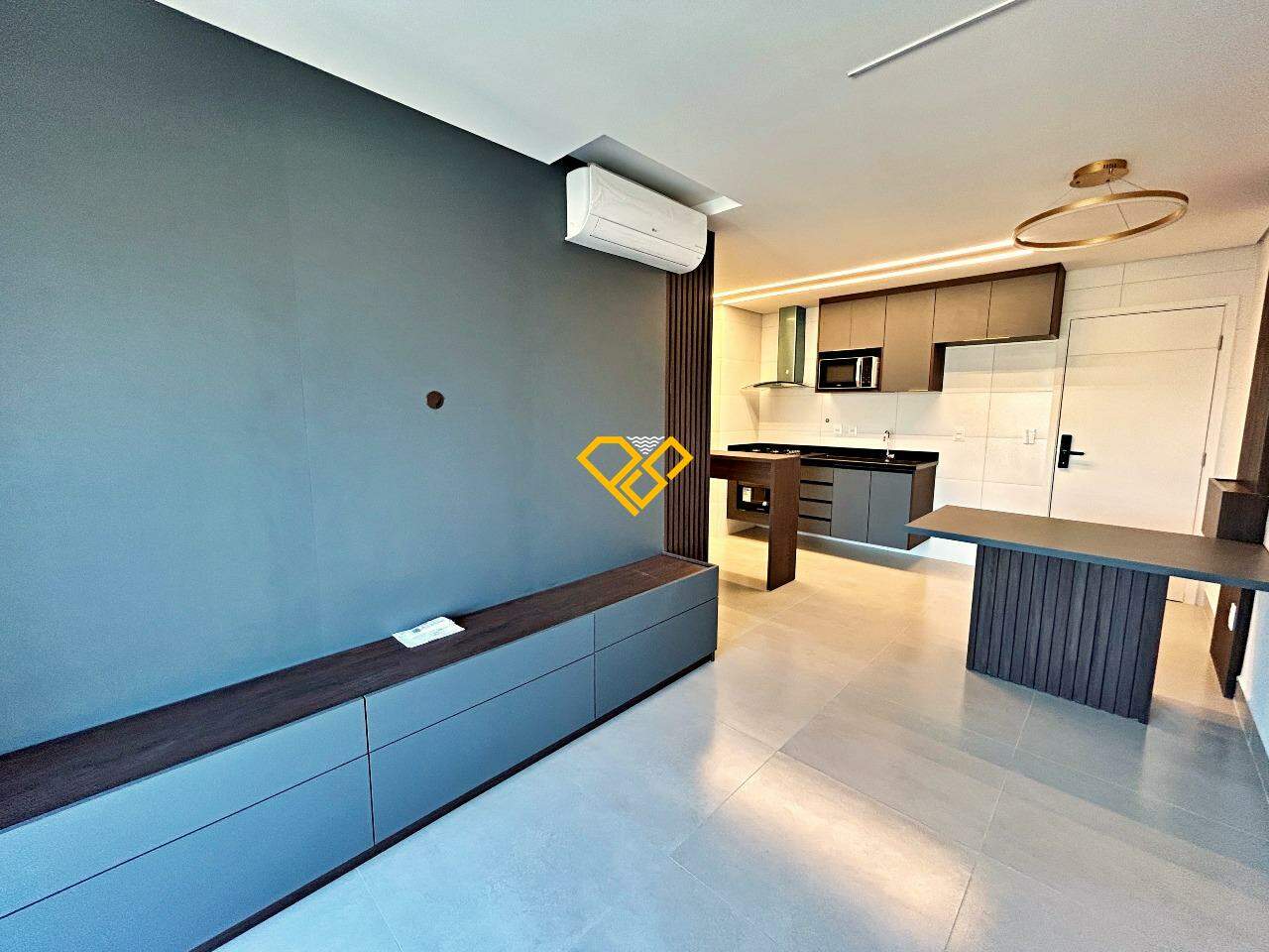 Apartamento para aluguel no Macuco: Sala e cozinha integrada