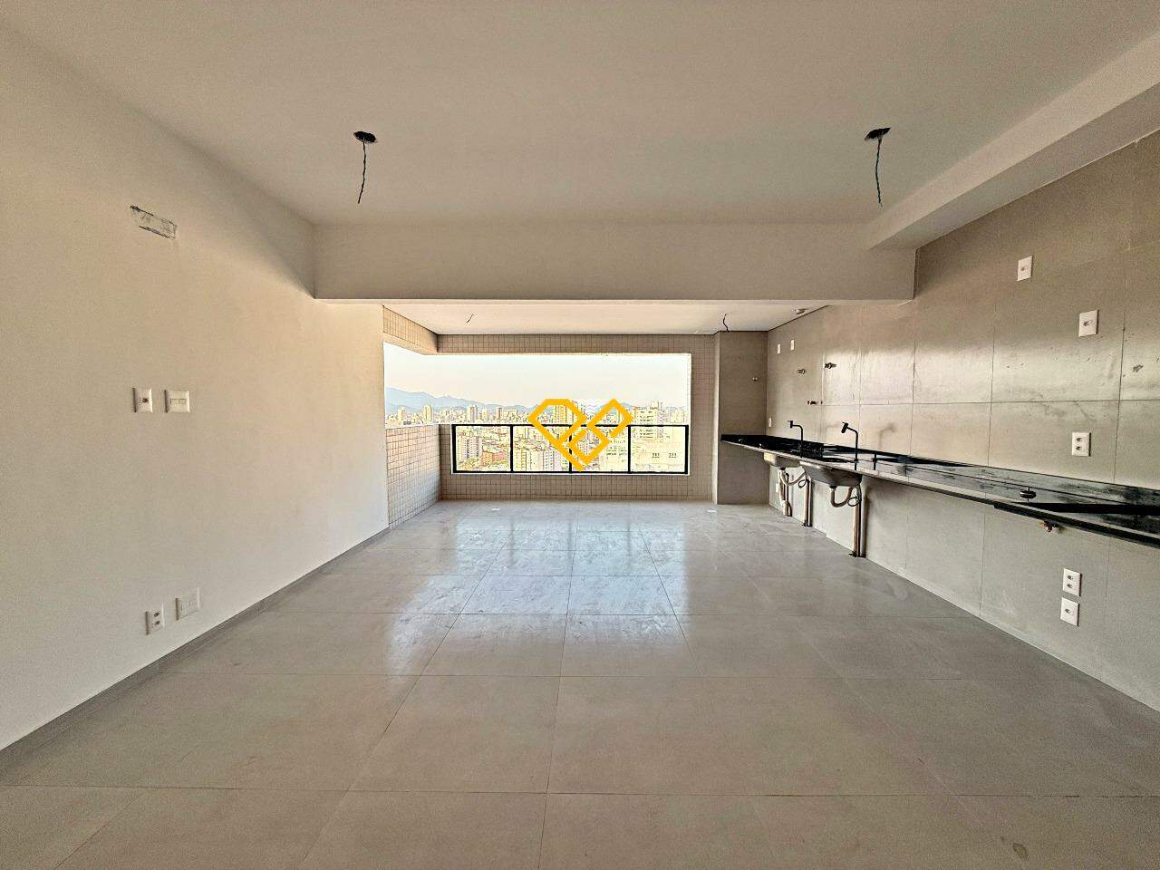 Apartamento à venda no José Menino: Sala e cozinha integrada
