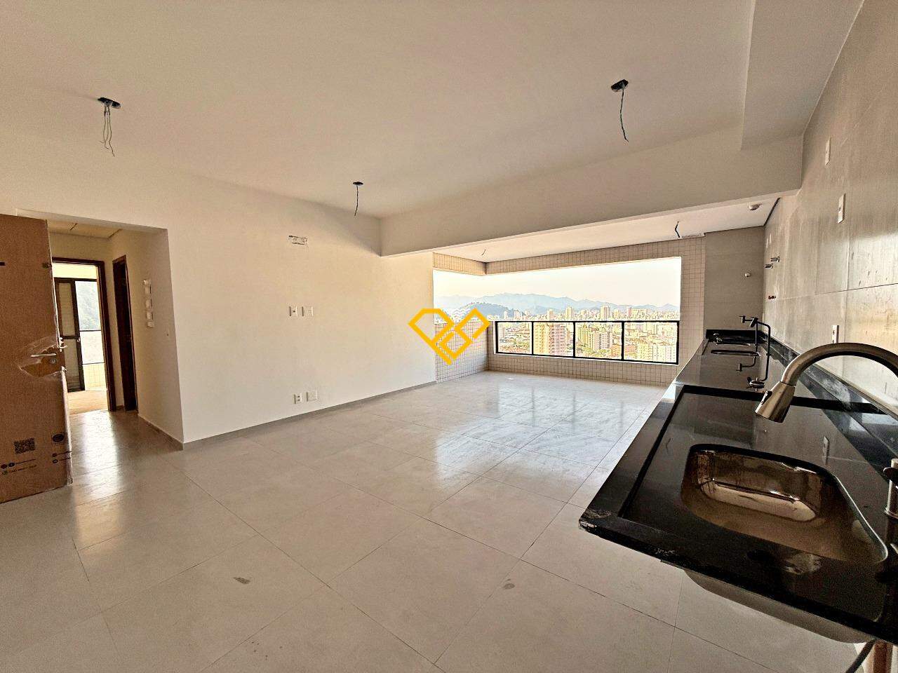 Apartamento à venda no José Menino: Sala e cozinha integrada