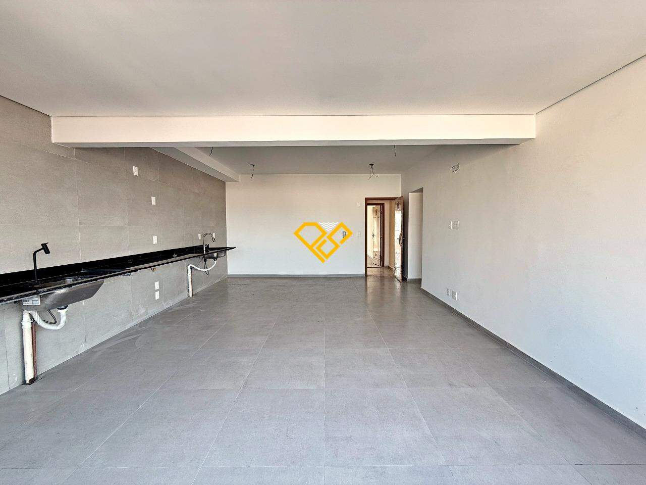 Apartamento à venda no José Menino: Sala e cozinha integrada