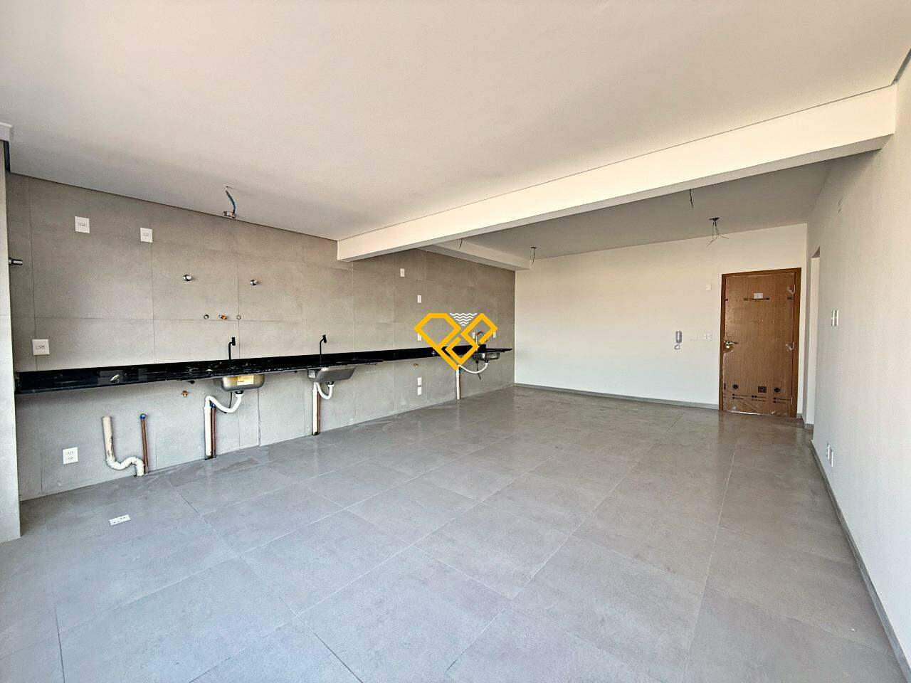 Apartamento à venda no José Menino: Sala e cozinha integrada