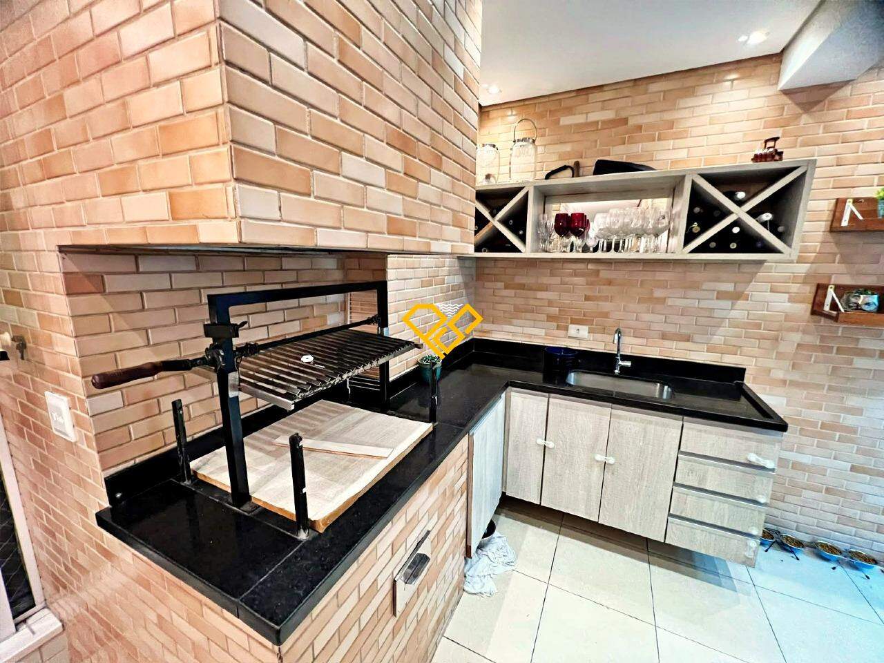 Apartamento à venda no Gonzaga: Varanda com churrasqueira