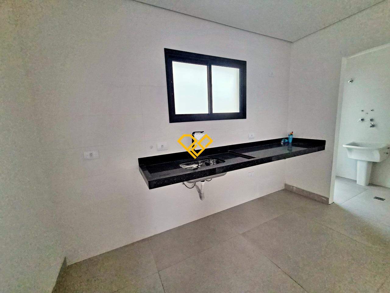Sobrado à venda no Estuário: Cozinha