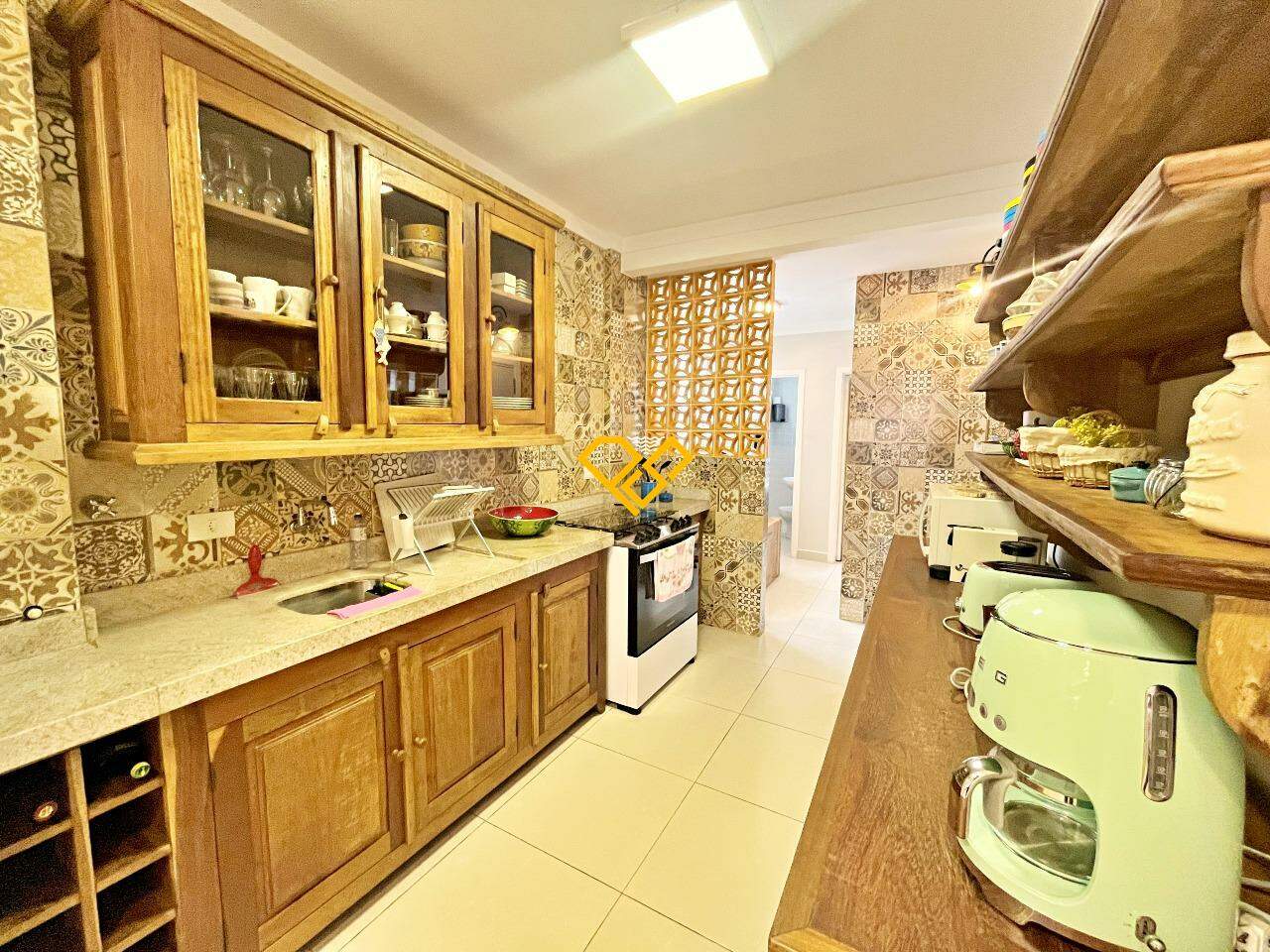 Apartamento à venda no Gonzaga: Cozinha integrada