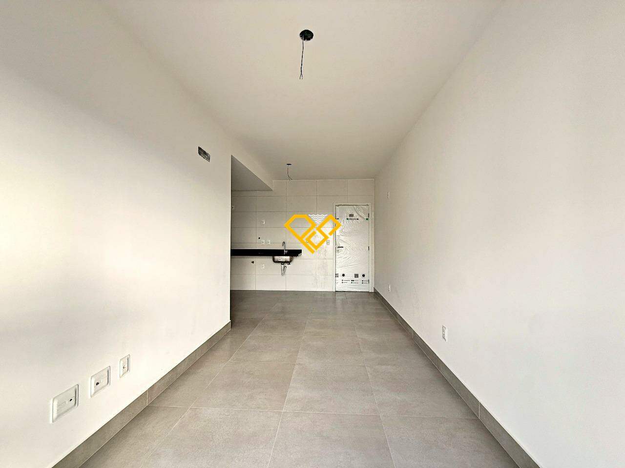 Apartamento à venda no Macuco: Sala e cozinha integrada