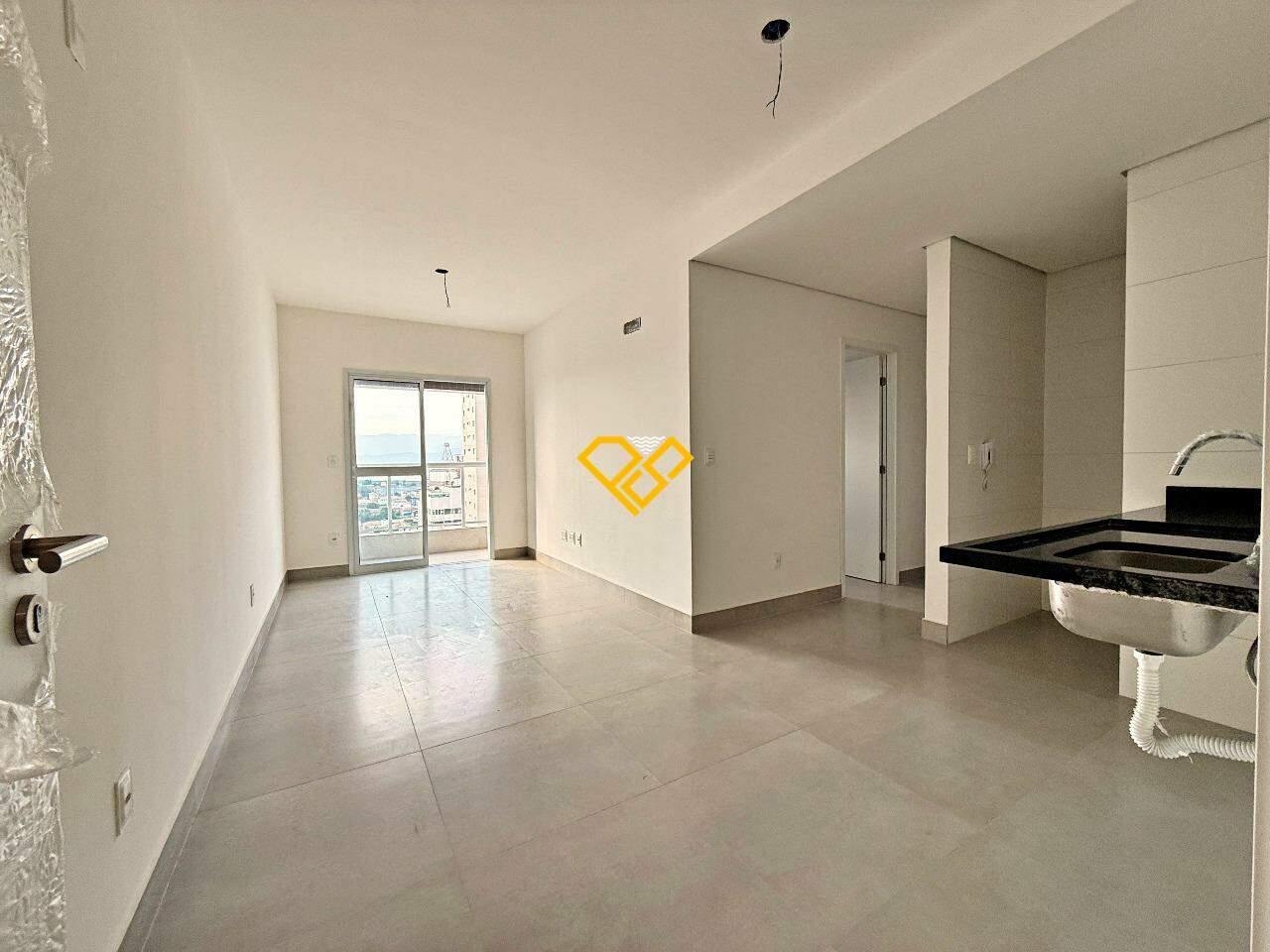 Apartamento à venda no Macuco: Sala e cozinha integrada