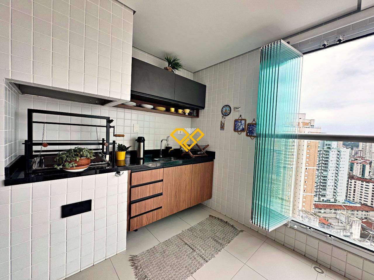 Apartamento à venda no Gonzaga: Varanda com churrasqueira