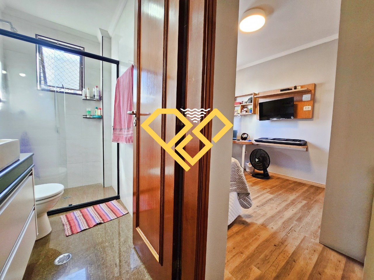 Apartamento à venda no Embaré: DORMITÓRIO 1 - SUÍTE