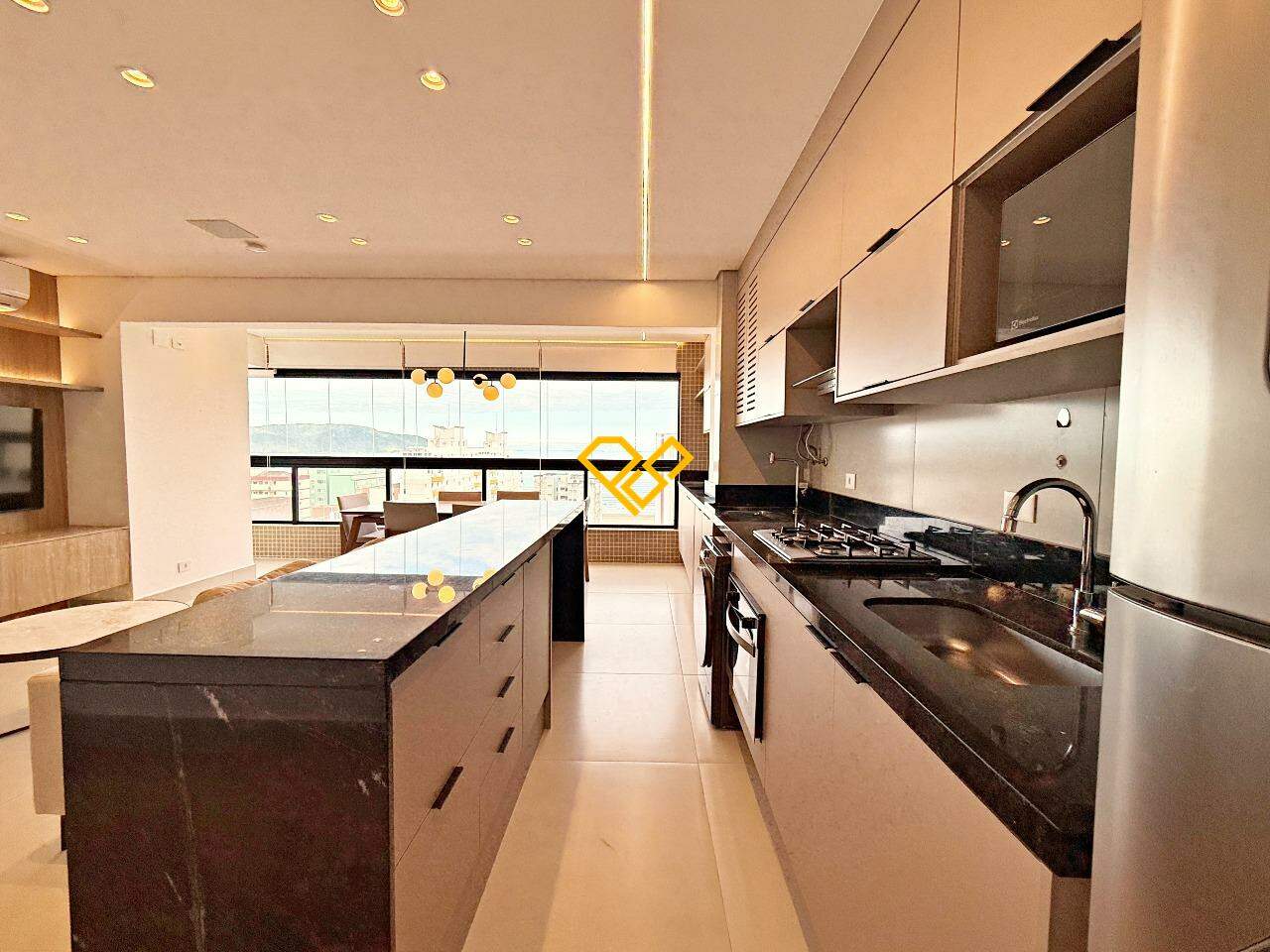 Apartamento à venda no José Menino: Sala e cozinha