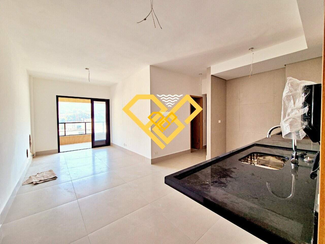Apartamento à venda no José Menino: Sala integrada com a cozinha