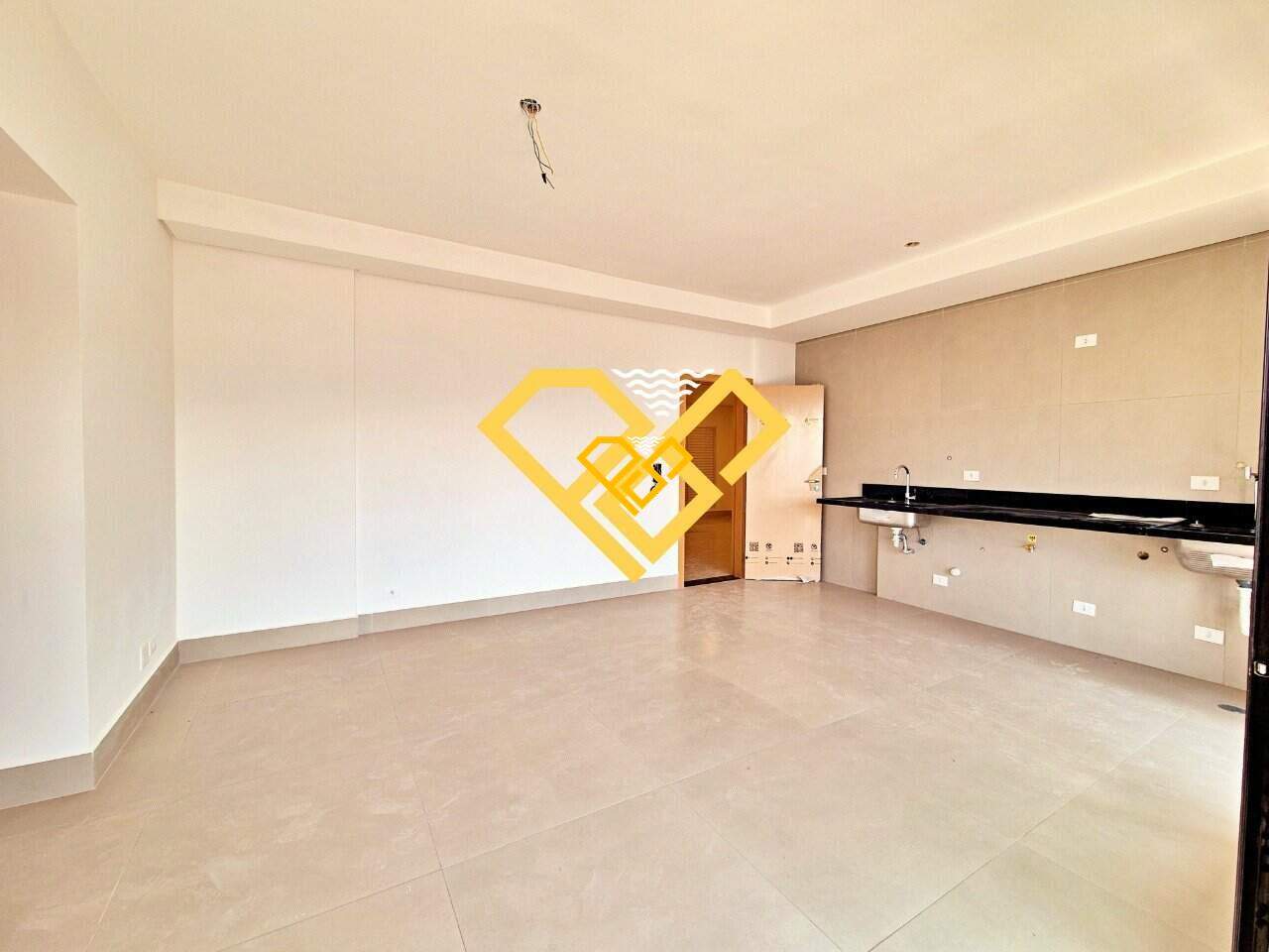 Apartamento à venda no José Menino: Sala e cozinha