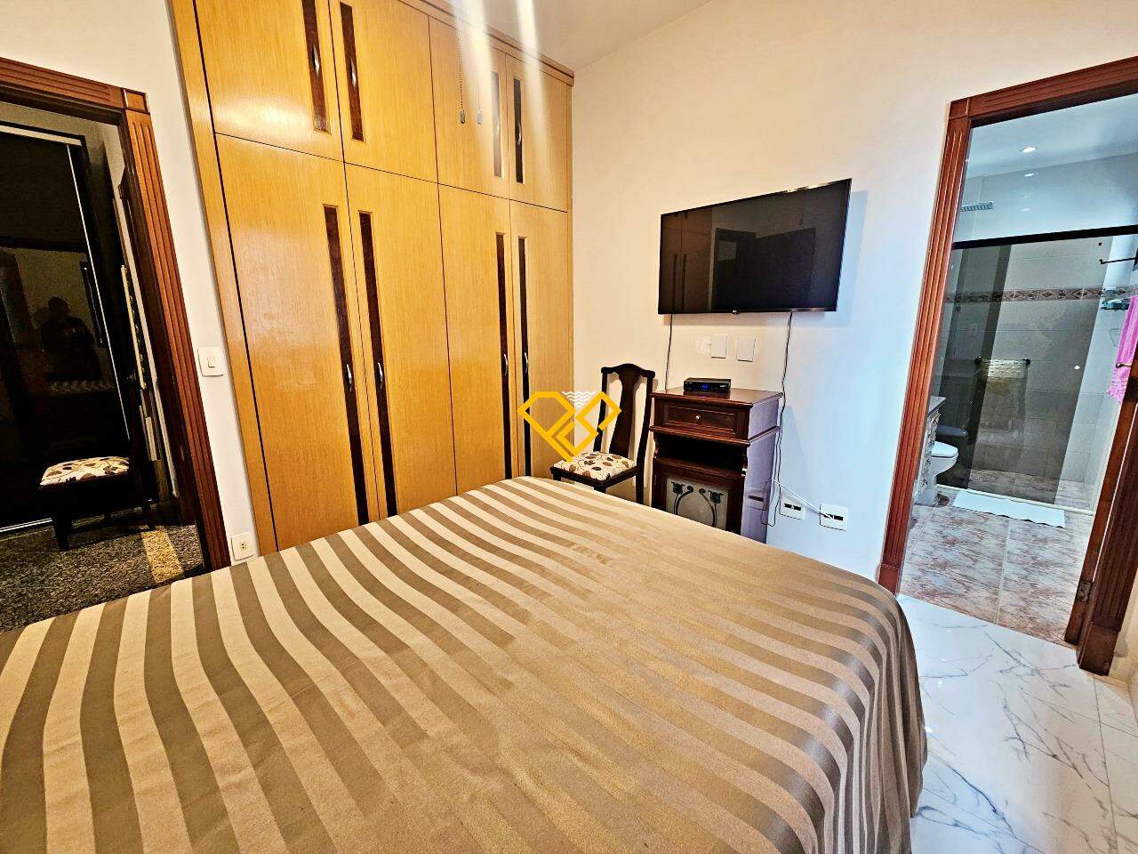 Apartamento à venda no Ponta da Praia: Suíte 1