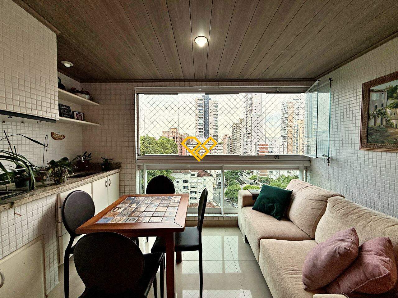 Apartamento à venda no Aparecida: Varanda com churrasqueira