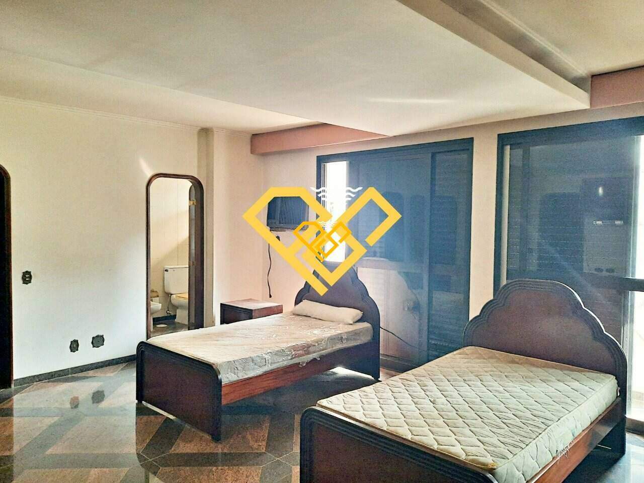 Apartamento à venda no Gonzaga: Dormitório 1 - suíte