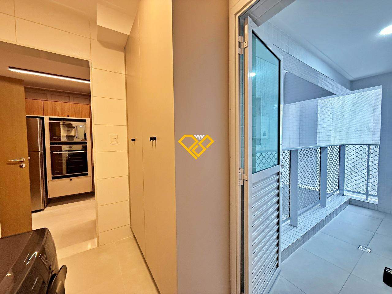 Apartamento à venda no Aparecida: Área de serviço e varanda técnica