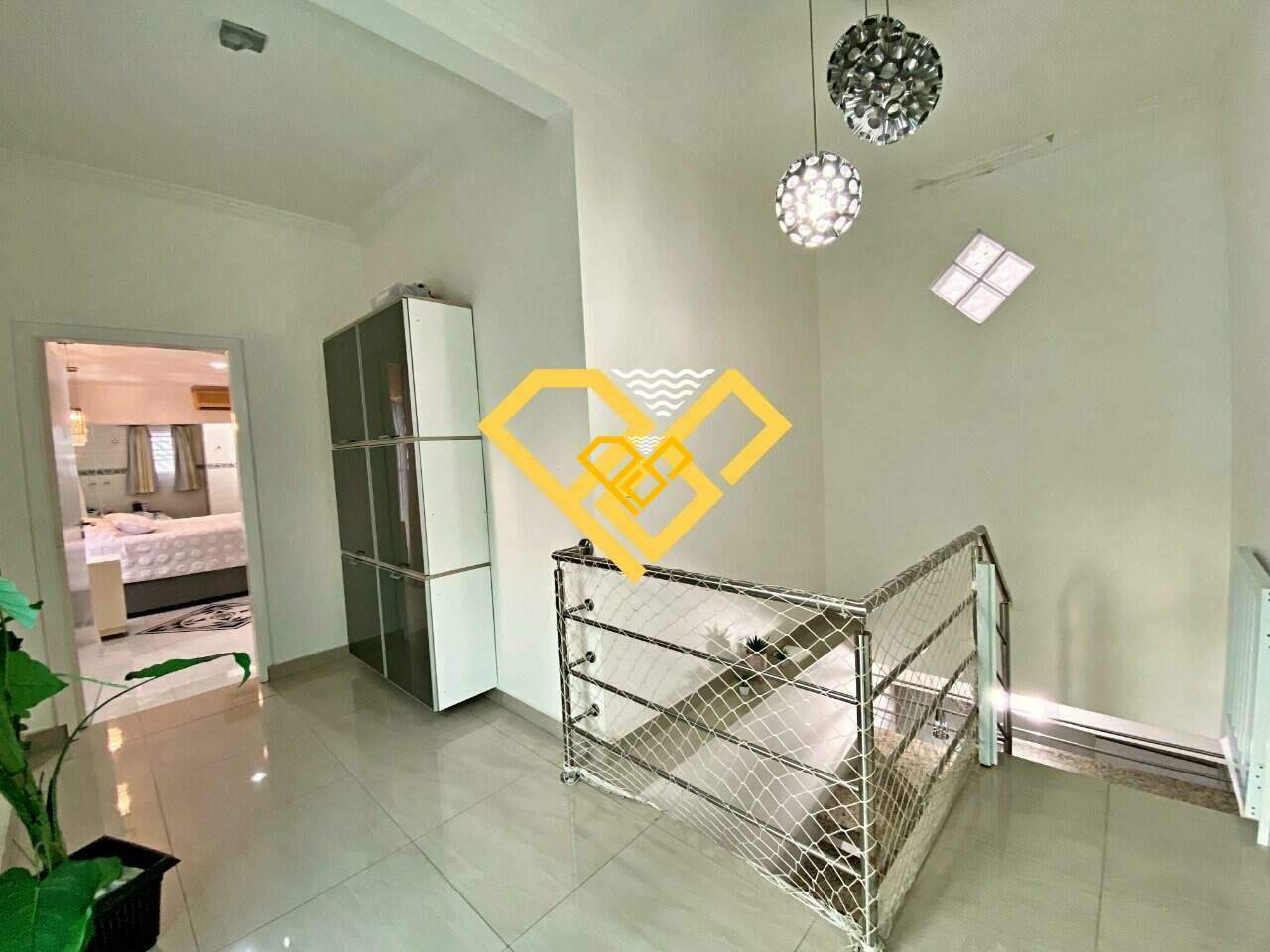 Sobreposta Alta à venda no Marapé: Hall para os quartos do segundo piso