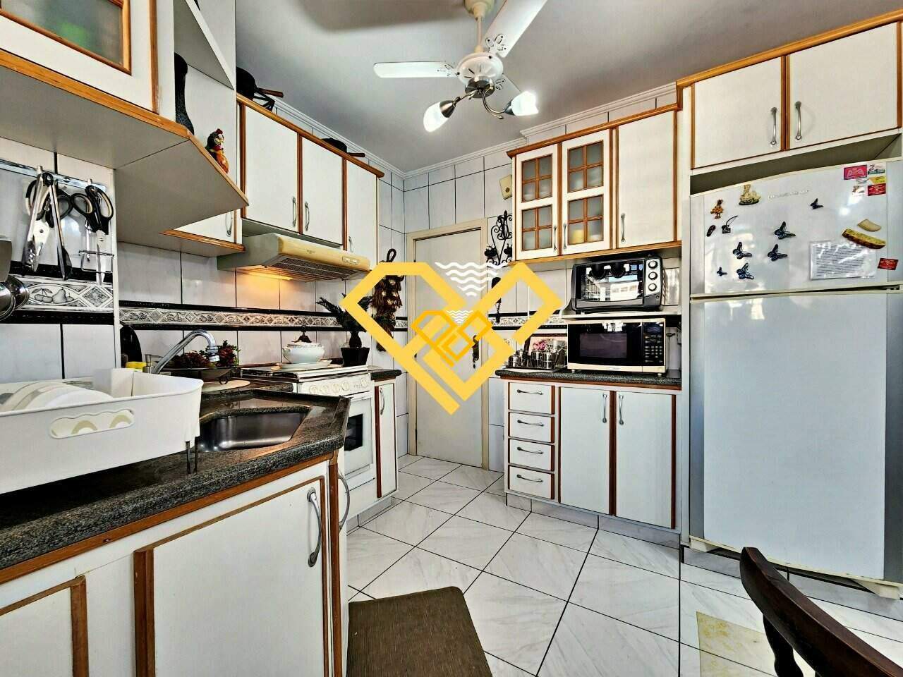 Apartamento à venda no Gonzaga: Cozinha