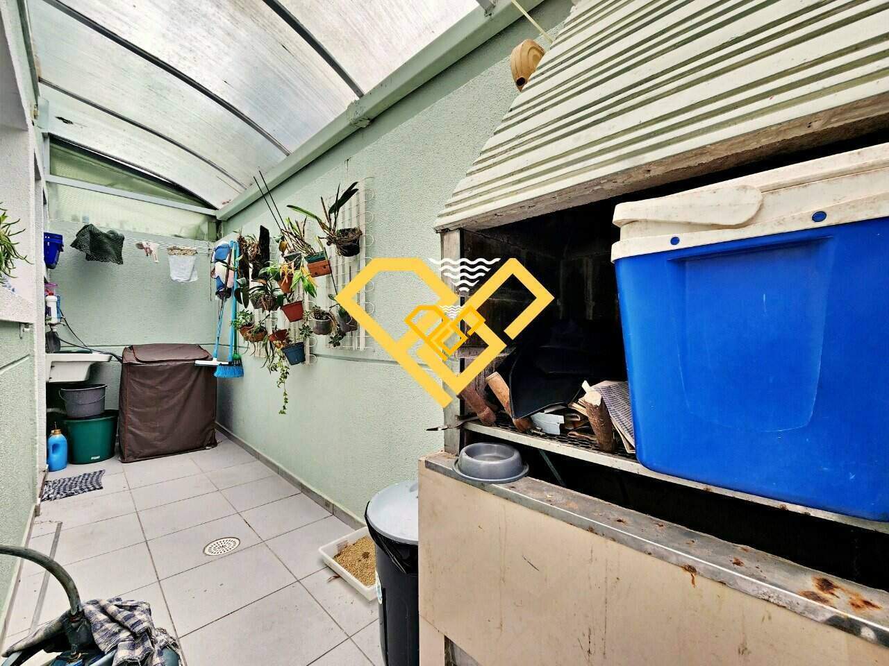 Sobrado à venda no Campo Grande: Área de serviço com churrasqueira