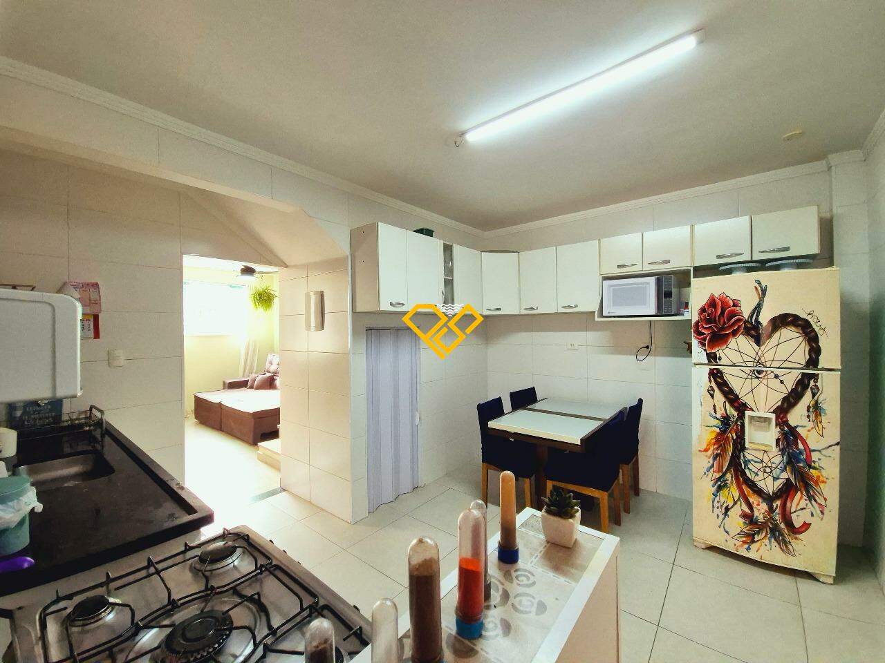 Sobrado à venda no Estuário: cozinha piso inferior