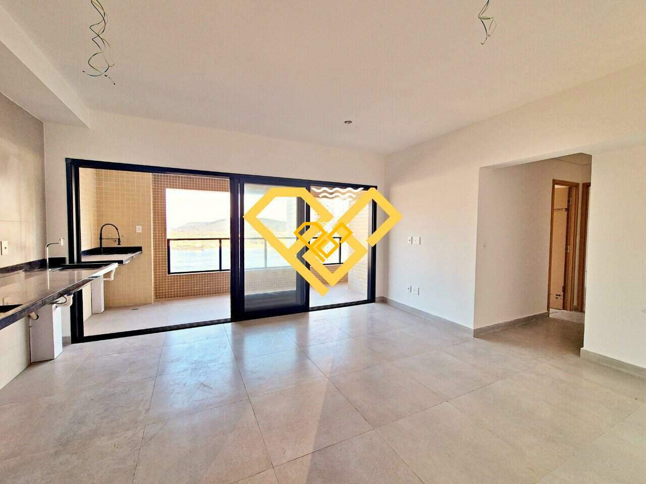 Apartamento à venda no Ponta da Praia: Sala e cozinha