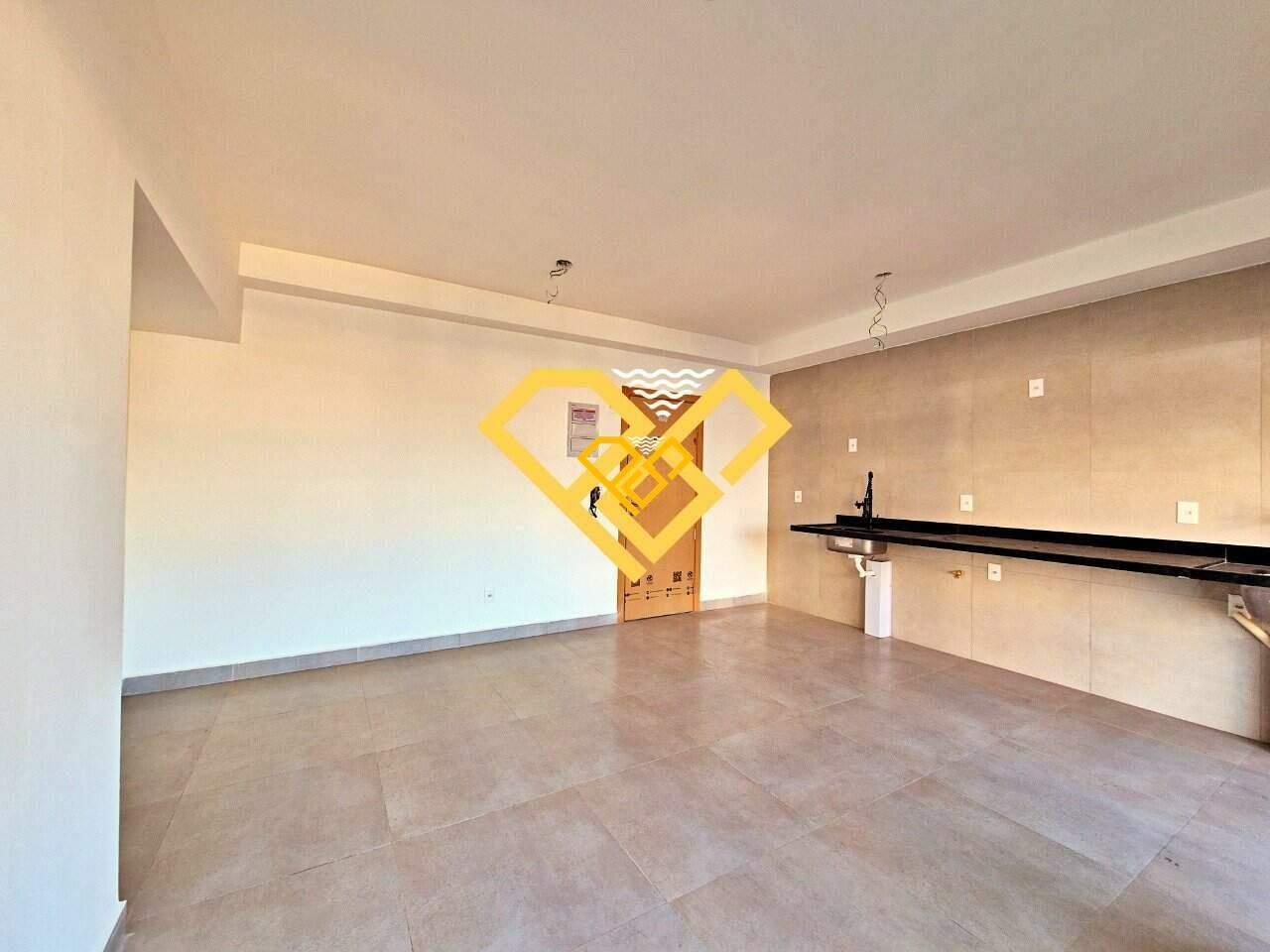 Apartamento à venda no Ponta da Praia: Sala e cozinha