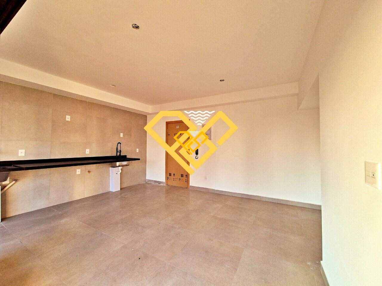 Apartamento à venda no Ponta da Praia: Sala e cozinha