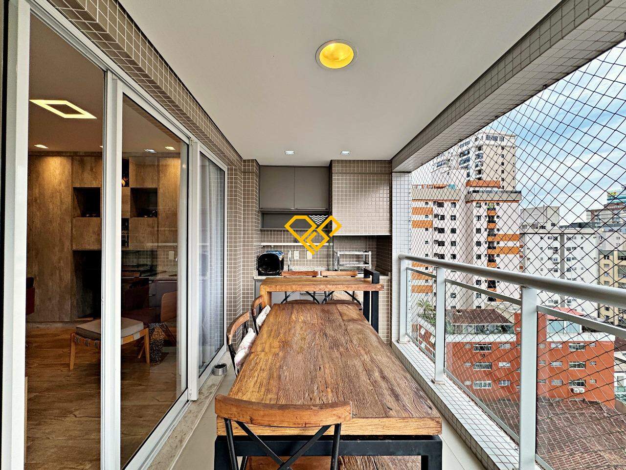 Apartamento à venda no José Menino: Varanda com churrasqueira