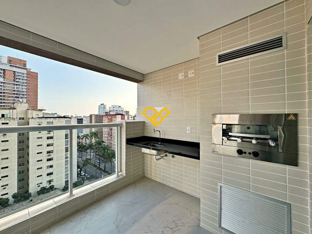 Apartamento à venda no Gonzaga: Varanda com churrasqueira