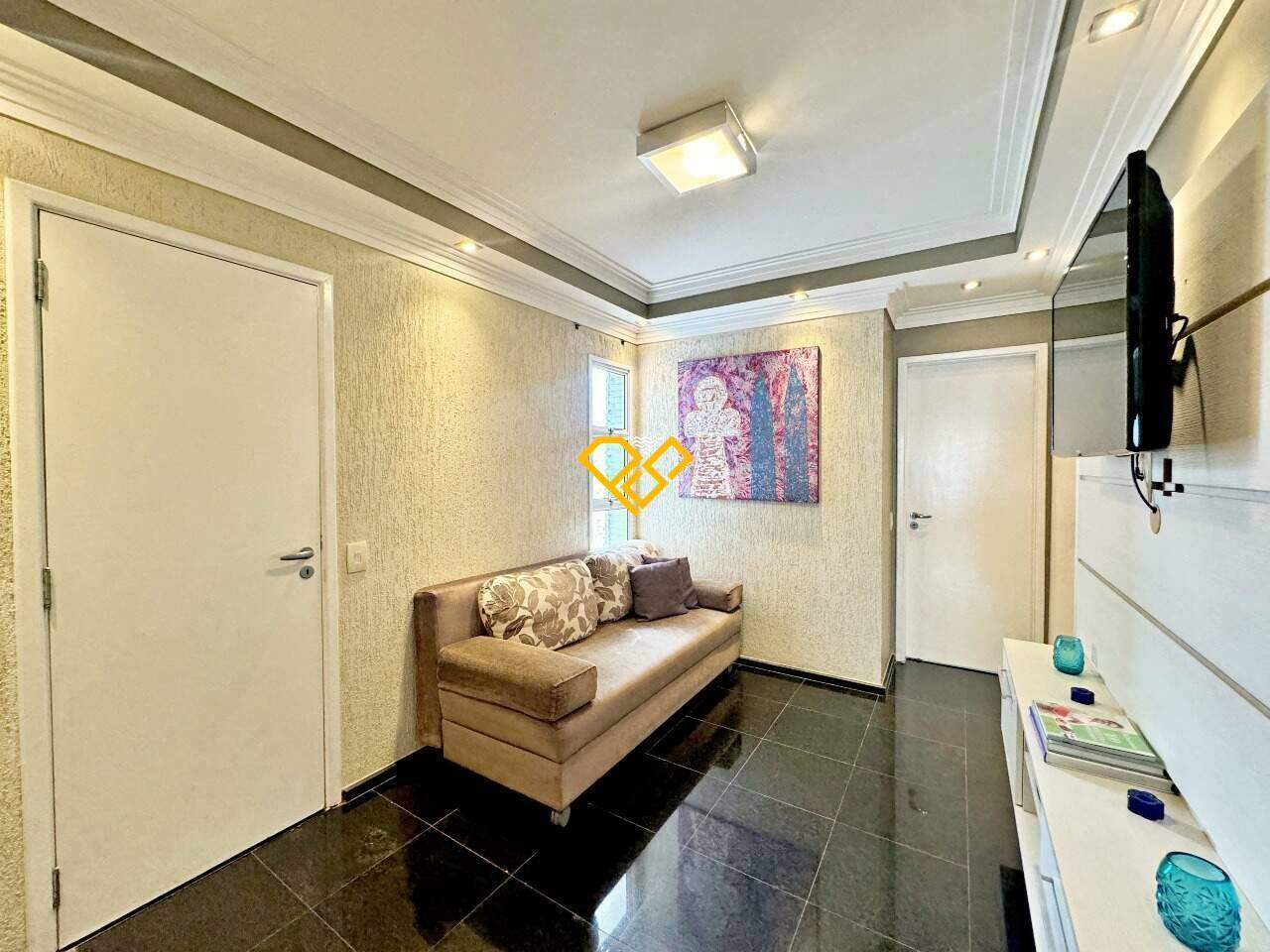 Apartamento à venda no Ponta da Praia: Sala de tv