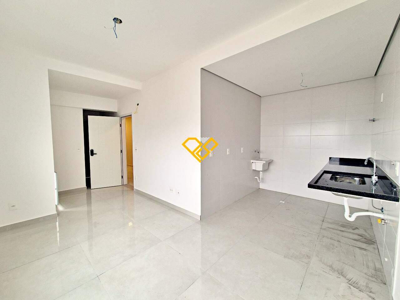 Apartamento à venda no Ponta da Praia: Sala e cozinha