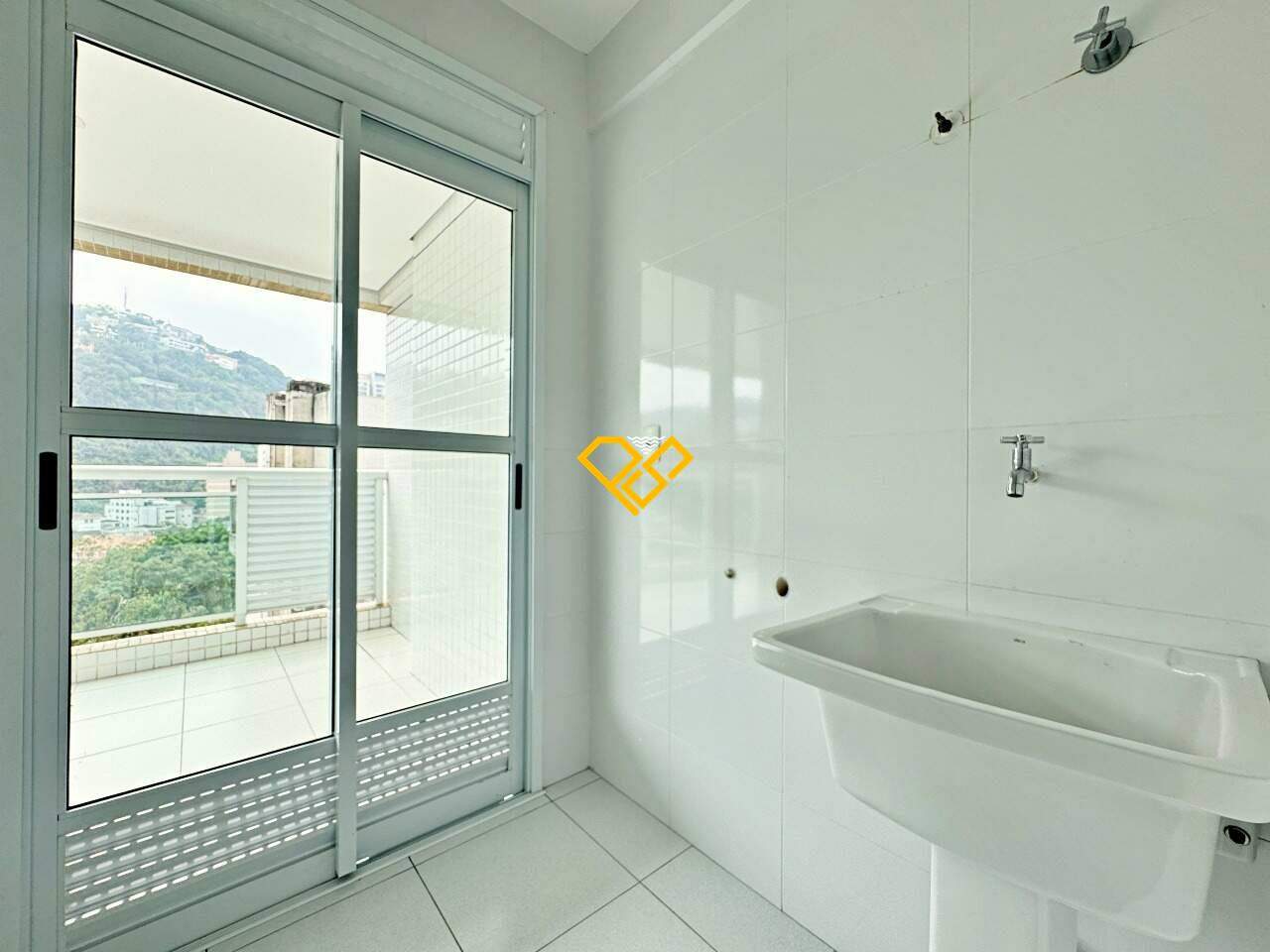 Apartamento à venda no José Menino: ÁRea de serviço