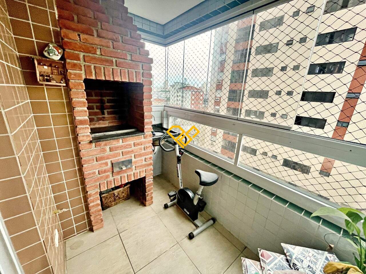 Apartamento à venda no Aparecida: Varanda com churrasqueira