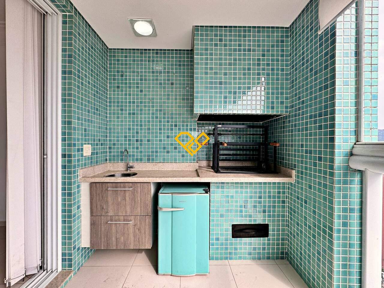 Apartamento à venda no Aparecida: Varanda com churrasqueira