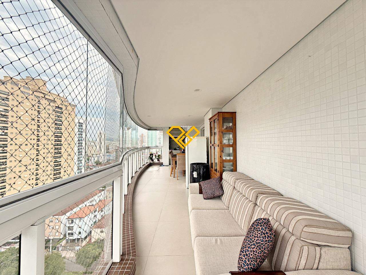 Apartamento à venda no Aparecida: Varanda com churrasqueira