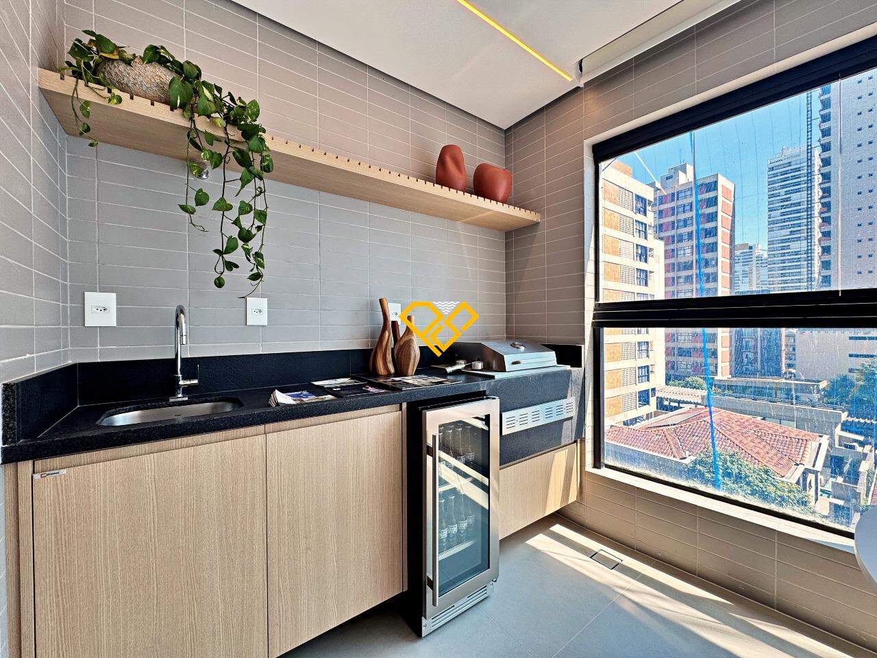 Apartamento à venda no Aparecida: Varanda com churrasqueira