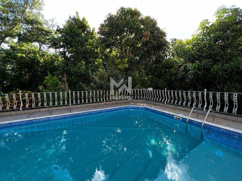 Casa em Condomínio à venda no Condomínio Marambaia: piscina com vista APP