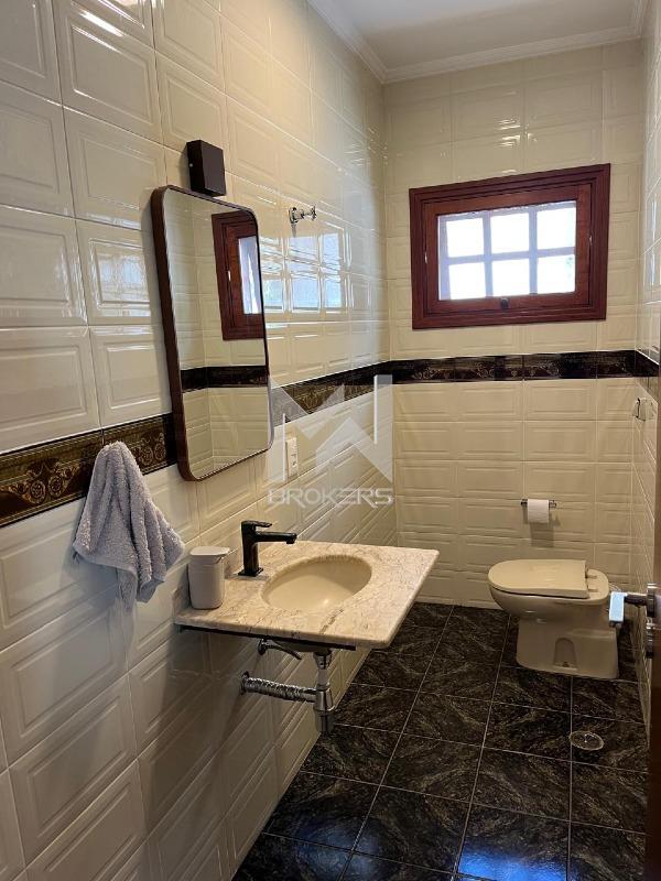 Casa em Condomínio à venda no Condomínio Marambaia: lavabo