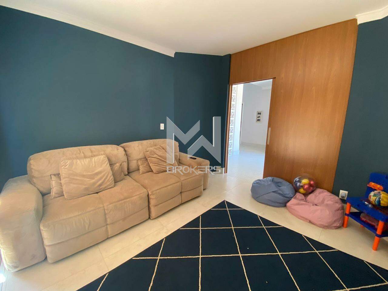 Casa em Condomínio à venda no Centro: sala de TV