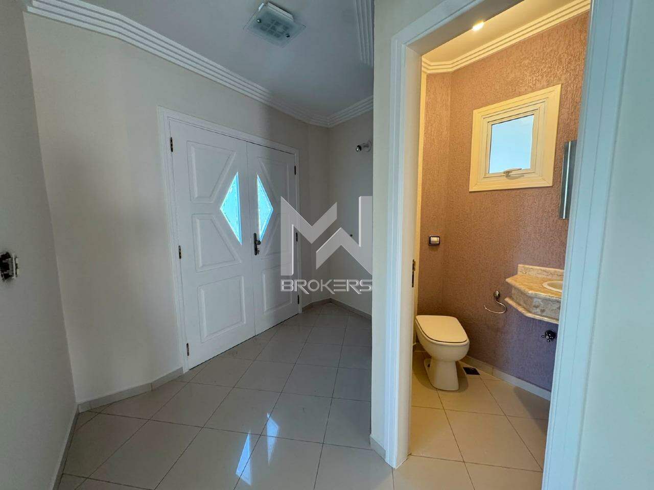 Casa em Condomínio para aluguel no Santa Rosa: Hall de entrada/lavabo