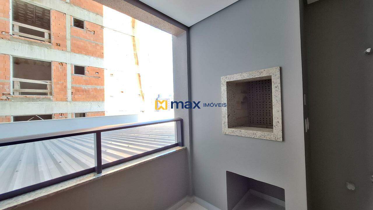 Apartamento à venda no Centro: Sacada com churrasqueira