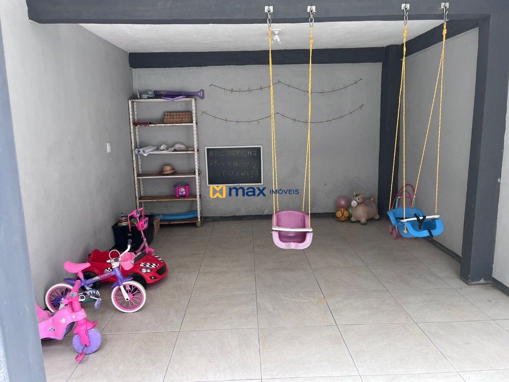 Casa à venda no Centro: Garagem coberta