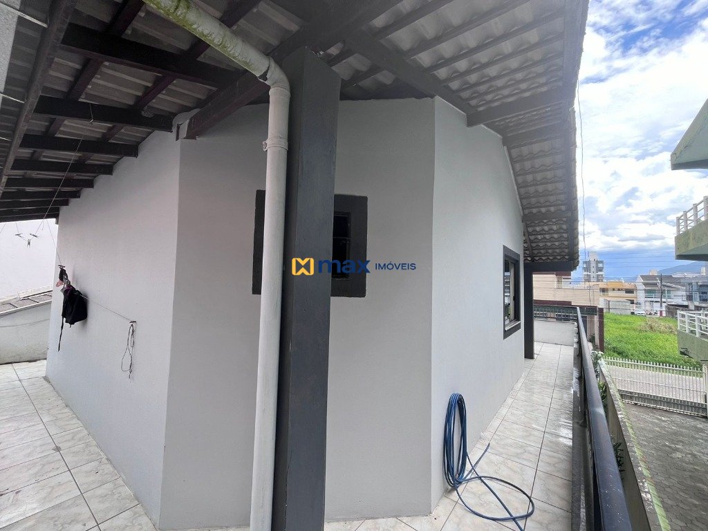 Casa à venda no Centro: Sacada lateral