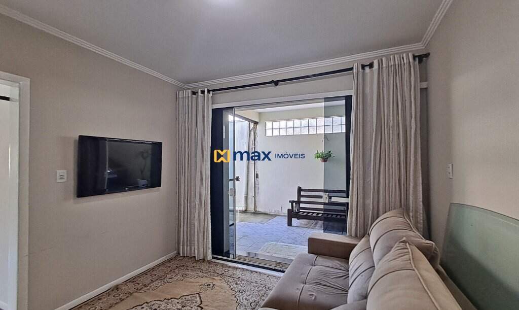 Casa Comercial à venda no Centro: (parte residencial fundos) Sala de Estar e TV