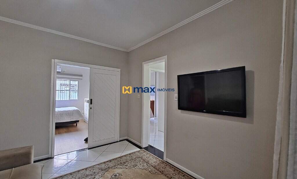 Casa Comercial à venda no Centro: (parte residencial fundos) Sala de Estar e TV