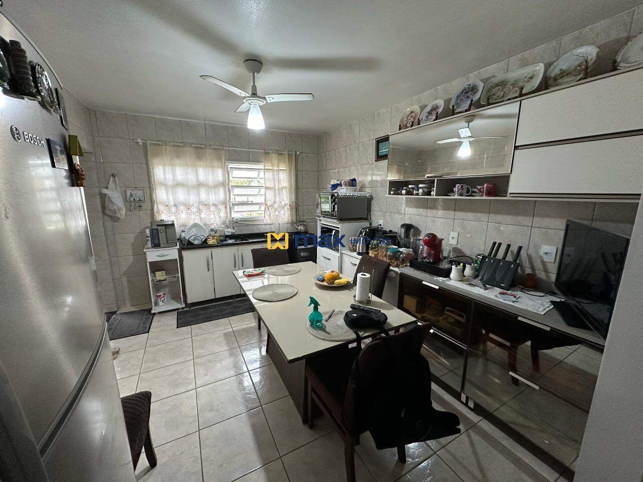 Casa à venda no Centro: Cozinha piso superior