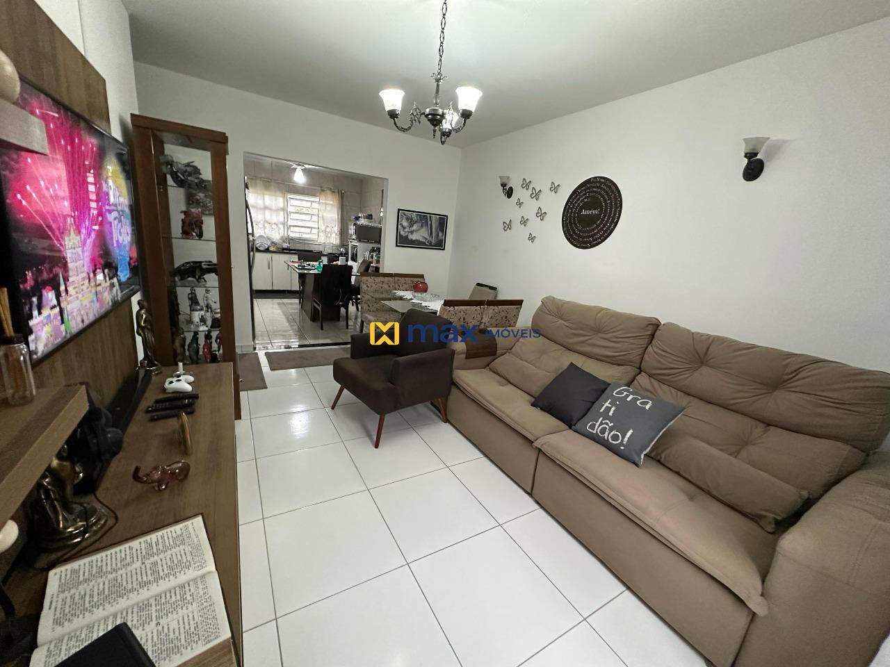 Casa à venda no Centro: Sala de estar piso superior